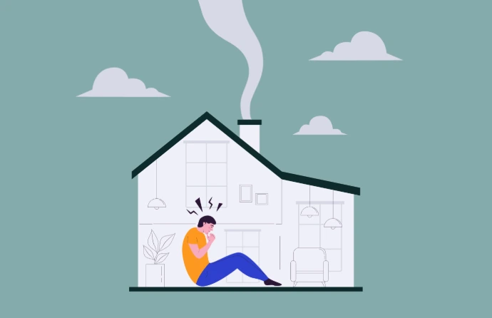 Man sitting in hime stressed about house